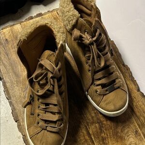 UGG Brown High-Top Sneakers with Fur Lining/side zippers.